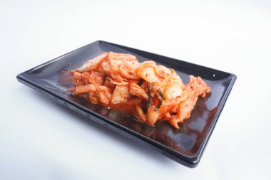 Kimchi Güney Kore 'den gelen geleneksel mayalanmış bir yemektir. Kırmızı biber, gochugaru, sarımsak, zencefil vs. ile baharatlı Çin lahanası turşusu yapılır..