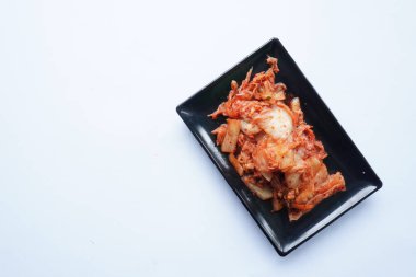 Kimchi Güney Kore 'den gelen geleneksel mayalanmış bir yemektir. Kırmızı biber, gochugaru, sarımsak, zencefil vs. ile baharatlı Çin lahanası turşusu yapılır..