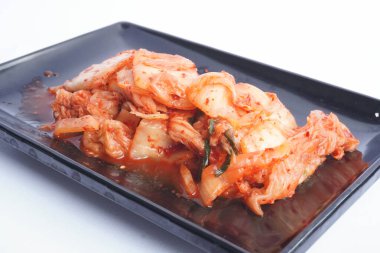 Kimchi Güney Kore 'den gelen geleneksel mayalanmış bir yemektir. Kırmızı biber, gochugaru, sarımsak, zencefil vs. ile baharatlı Çin lahanası turşusu yapılır..