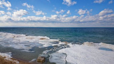 Drone shot of Georgian Bay Ice Pack Breaking Up and Melting in February due to Warming Climate clipart