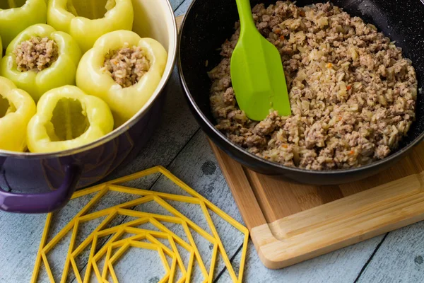 stock image Preparation of Stuffed yellow peppers