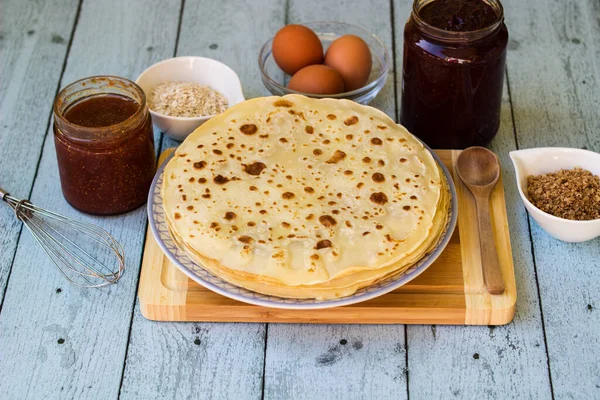 stock image Preparation of a thin pancakes