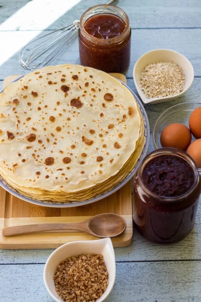 Stock image Preparation of a thin pancakes