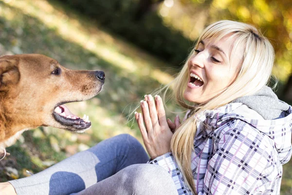 Young Woman Embracing Her Dog — Stock Photo, Image
