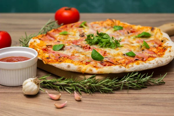 stock image Italian pizza Capricciosa  with cheese, tomato sauce and basil