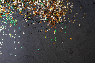 Noel ve diğer kutlamalar için çok renkli sim arkaplanı. Siyah arka plan. Noel, lüks, başarı, kutlama gibi konuların çeşitliliği için