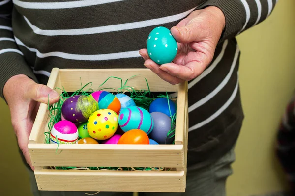 Senior Woman Hands Holding Colorful Easter Eggs Crate — Stock Fotó