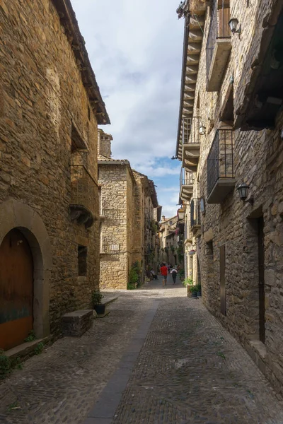 stock image Street with stone houses in the medieval village of Ainsa in the pyrenees, Aragon, Spain