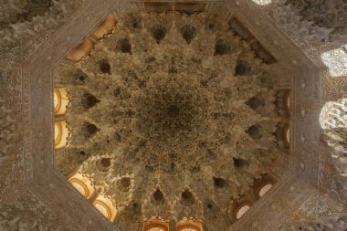 Ceiling with Muqarnas in the Hall of the Two Sisters Sala de las Dos Hermanas at Nasrid Palaces of Alhambra, Granada, Andalusia, Spain clipart