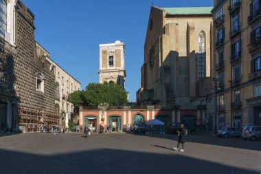 Cityscape of townsquare Piazza del Gesu Nuovo with Church, Naples, Campania, Italy clipart
