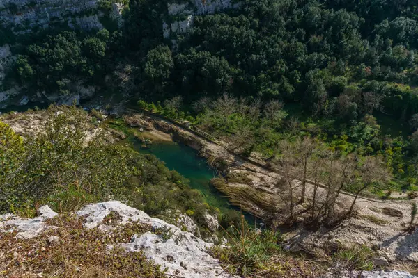 stock image View of canyon of the Anapo valley with river at the nature reserve Pantalica with flood damage, Siracusa, Sicily, Italy