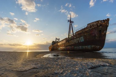 Abandoned stranded dimitrios shipwreck at the beach of Valtaki, Peloponnese, Greece clipart