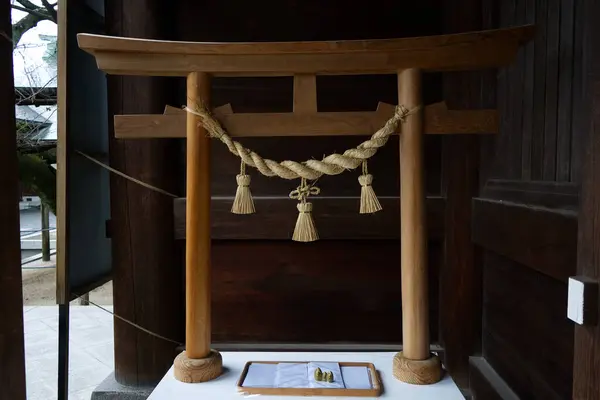 stock image A model of a wooden torii gate at Miyajidake Shrine in the Hakata district of Fukuoka, Japan