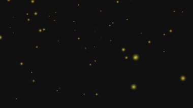 Siyah arkaplanda yükselen altın toz parçacıkları kutlama ve lüks tema için mükemmeldir.
