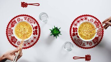 Eating Ramen Noodles For New Year.