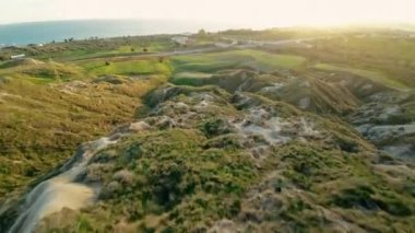 Diving From The Hills At Sunset.