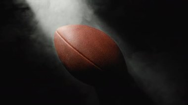 Close up of A Football ball on black background 