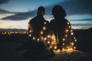 Couple with little light outdoor