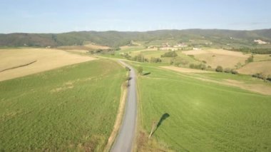 Aerial view of expanse of rolling cultivated hills