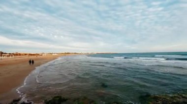 Kumsallı körfez. Zaman Uygulaması.