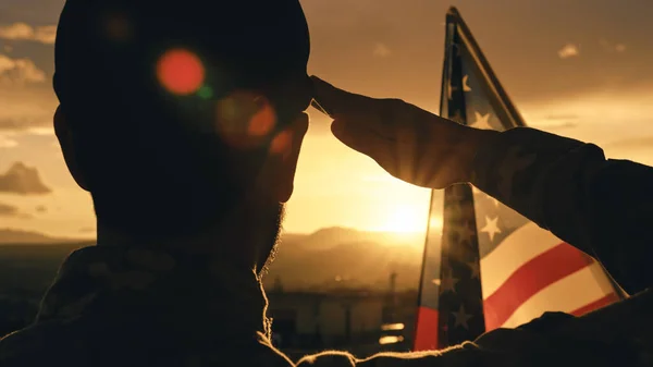stock image American soldier silhouette at sunset