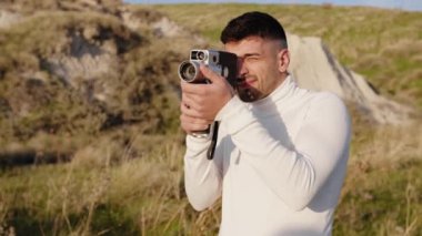 Engaged couple outdoor in a field 