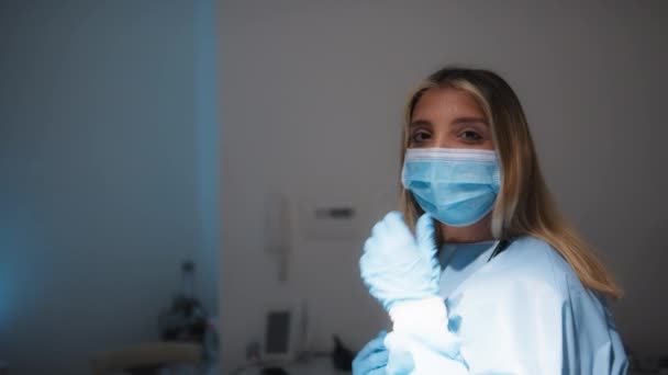 Female Nurse Smiles Camera — Stock Video