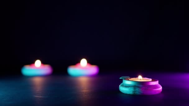 Kleurrijke Diwali Kaarsen Zwarte Achtergrond — Stockvideo
