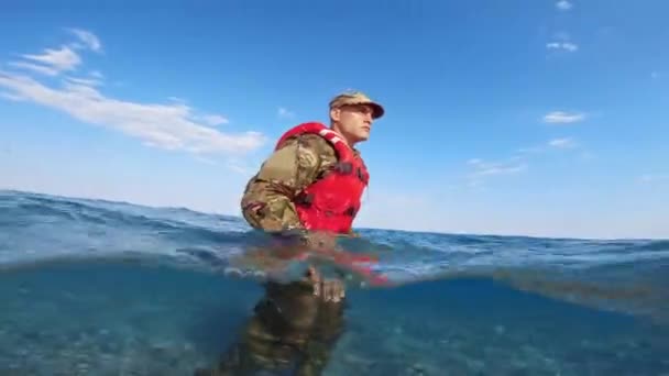 Soldier Walks Sea Water — Stock Video