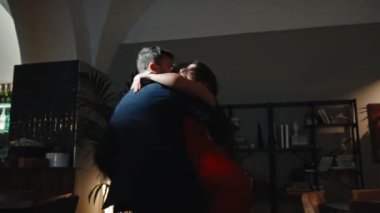 Happy Couple dancing at evening 