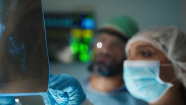 Medical Team Examine Ray Surgery Room — Stock Video