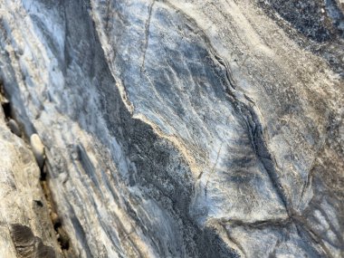 Açık beyaz kaya dokusu. Dağ engebeli yüzey.