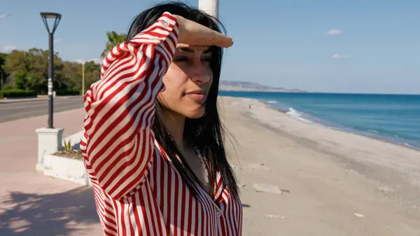 stock image Woman Looking At The Sea Covering Eyes With Hands . 