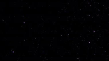 Havada süzülen mor parıltılar .