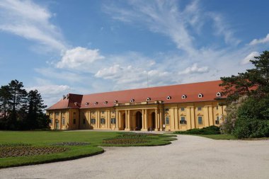 Front View of old historical castle riding school of Lednice Castle with blue sky with clouds, UNESCO World Heritage in Lednice, South Moravia, Czech Republic. High quality photo