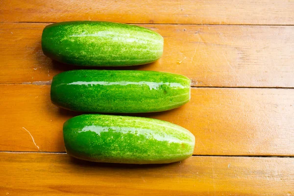 Few Fresh Cucumbers Wooden Background — Stock Photo, Image
