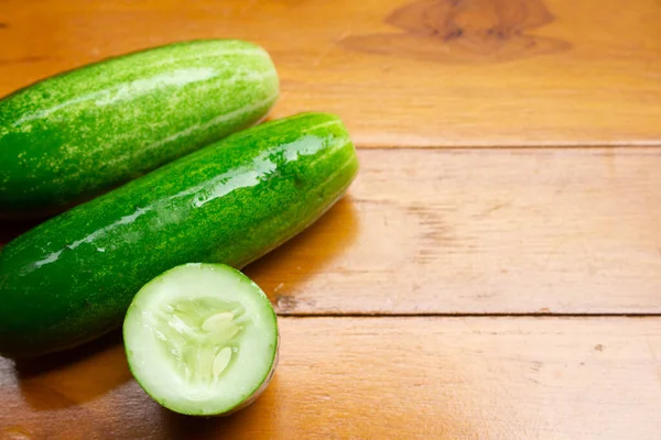 Few Fresh Cucumbers Wooden Background — Stock Photo, Image
