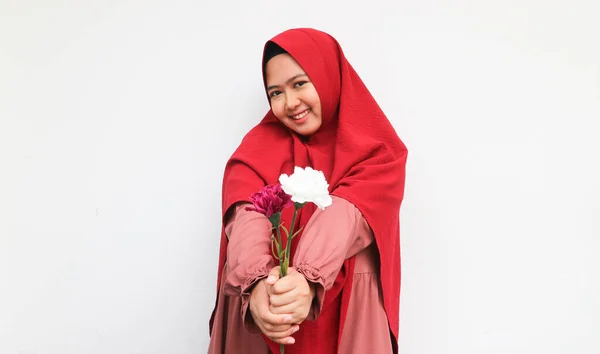 Smiling Young Asian Woman Holding Two Flower Stalks Gesture Giving — Stock Photo, Image