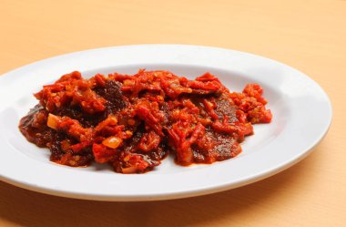 Dendeng balado ya da baharatlı etli kurutulmuş et, Endonezya 'nın batı sumatera bölgesinden geleneksel bir yemektir. 