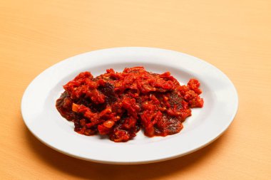 Dendeng balado ya da baharatlı etli kurutulmuş et, Endonezya 'nın batı sumatera bölgesinden geleneksel bir yemektir. 