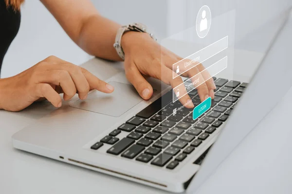 Woman hand typing on keyboard with login and password on screen display, cyber security concept, data protection and secured internet access.