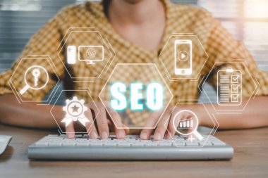 SEO Concept, Search Engine Optimization, Woman hand typing keyboard computer with VR screen seo icon, concept for promoting ranking traffic on website, optimizing your website to rank in search engines
