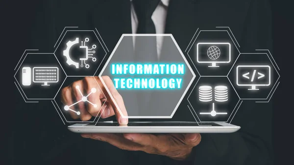 Information technology concept, Businessman using tablet with information technology icon on virtual screen.