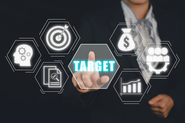Target concept, Business person hand touching target board icon on virtual screen, Target and goal as concept, Business achievement goal.