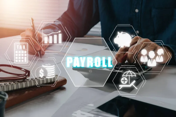 stock image Payroll business finance concept, Businessman analyzing financial data with Payroll icon on VR screen, Financial, accounting.