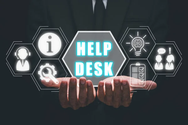 Communication Service Help Desk Concept, Person hand holding Help desk icon on virtual screen.
