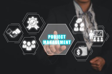 Project management concept, Businesswoman hand touching project management icon on virtual screen. clipart