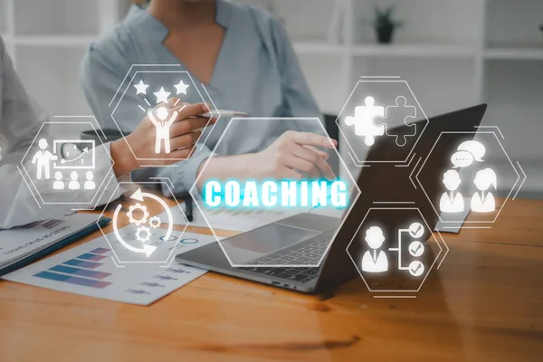 Coaching concept, Business person team working on laptop computer with coaching icon on virtual screen, Mentoring, Education, Business, Training, Development, E-learning.