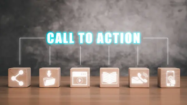 Call to action concept, Wooden block on desk with call to action icon on virtual screen.