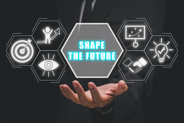 塑造未来的概念 商人手牵手塑造虚拟屏幕上的未来图标 — 图库照片